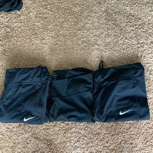 Three Nike leggings